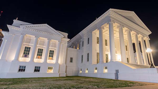 The Virginia State Capitol at night.